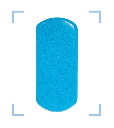 A close-up view of a bright California blue color swatch featuring a smooth finish with subtle dark speckled flecks throughout.