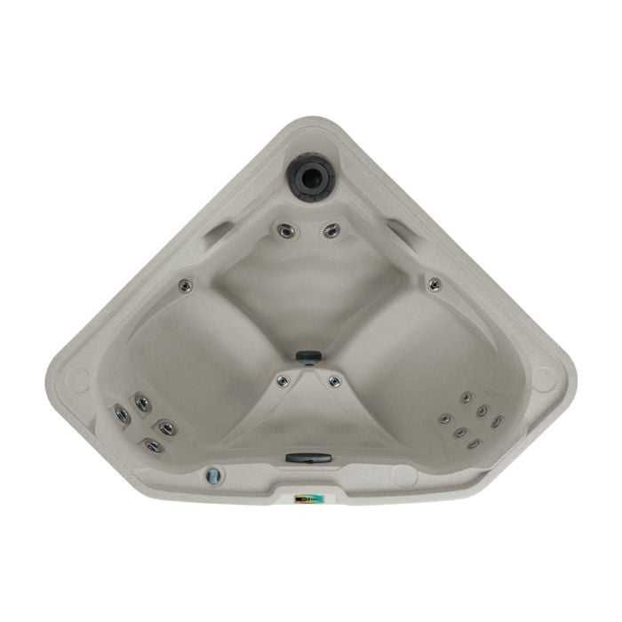 Direct top-down view of the Sand-colored Fantasy Spas Embrace triangular hot tub, highlighting its corner-fitting shape, seating layout, and 17 targeted hydrotherapy jets.
