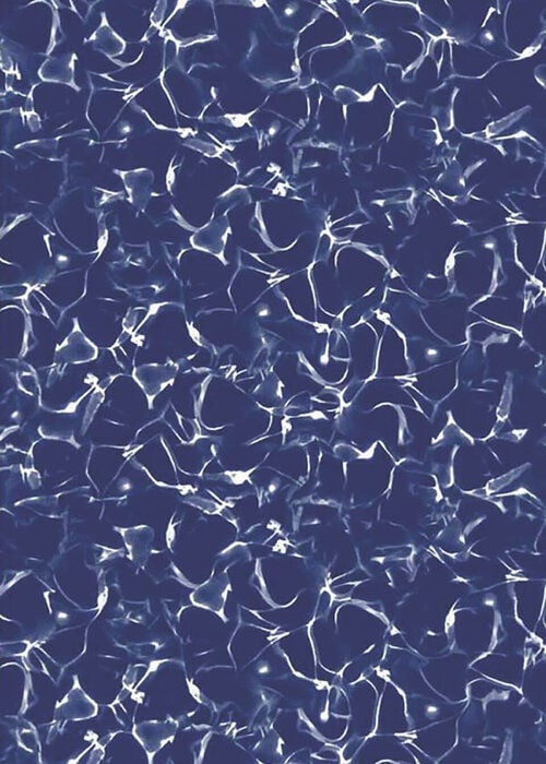 Close-up view of a vinyl pool liner pattern featuring a deep navy blue background with crisp white water-reflection caustics and wave ripple highlights throughout.