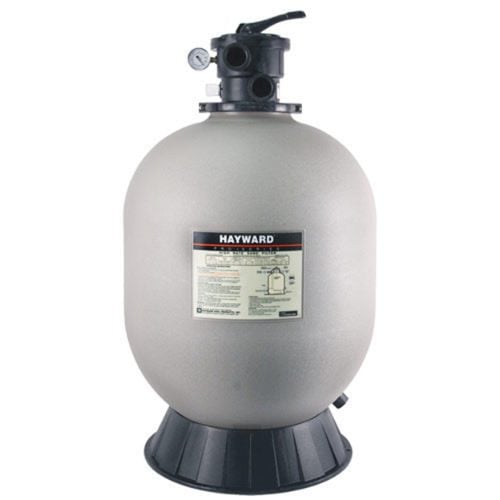 Studio product view of a round tan Hayward top-mount pool sand filter featuring a black multi-port valve with control handle, side pressure gauge, and sturdy black pedestal base.