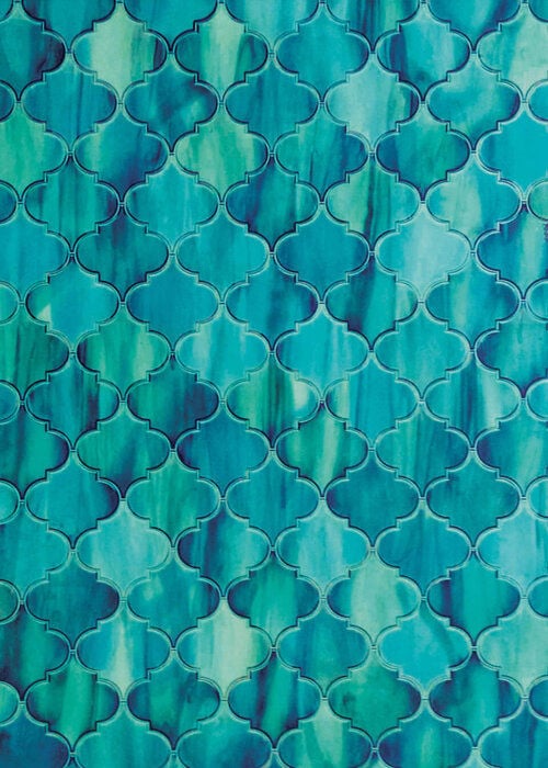 Close-up view of a vinyl pool liner pattern featuring an arabesque or lantern-shaped tile mosaic in vibrant shades of turquoise, teal, and aqua with a marbled glass effect.