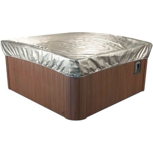 A rectangular hot tub covered with a silver insulating cover.