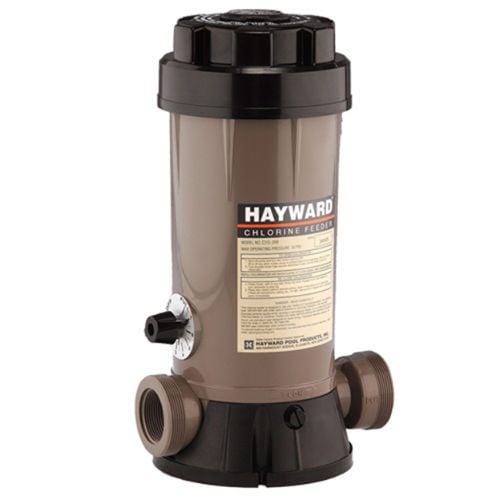Studio product view of a tan and black Hayward automatic chemical chlorine feeder with a side dial control valve and threaded plumbing connections.