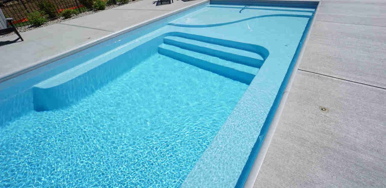 Architectural design schematic and side elevation profile of the Thursday Pools Lil Bob LX rectangular fiberglass pool measuring 13.5 feet wide by 35.5 feet long with a uniform depth of 4 feet 6 inches.